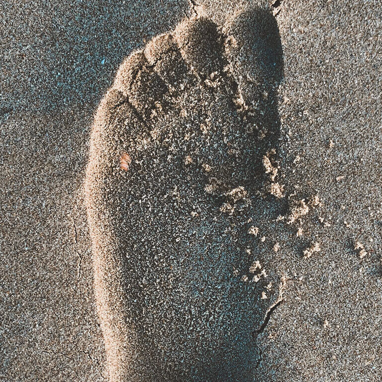 Fußabdruck im Sand